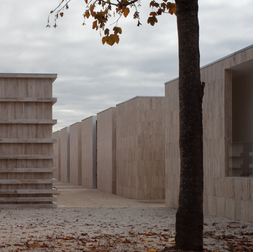 andrea dragoni completes contemplative cemetery extension in italy