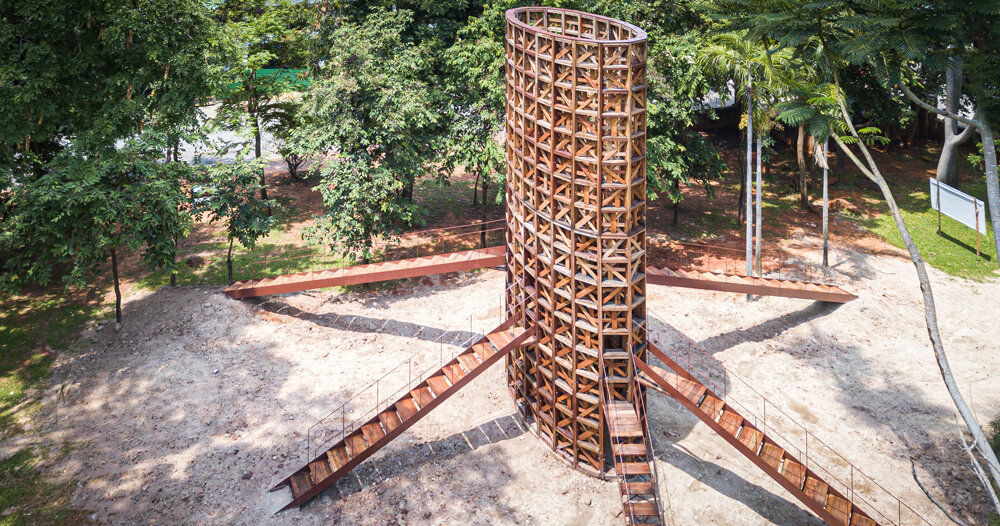 boonserm premthada repurposes derelict timber barns to erect 'rice tower'
