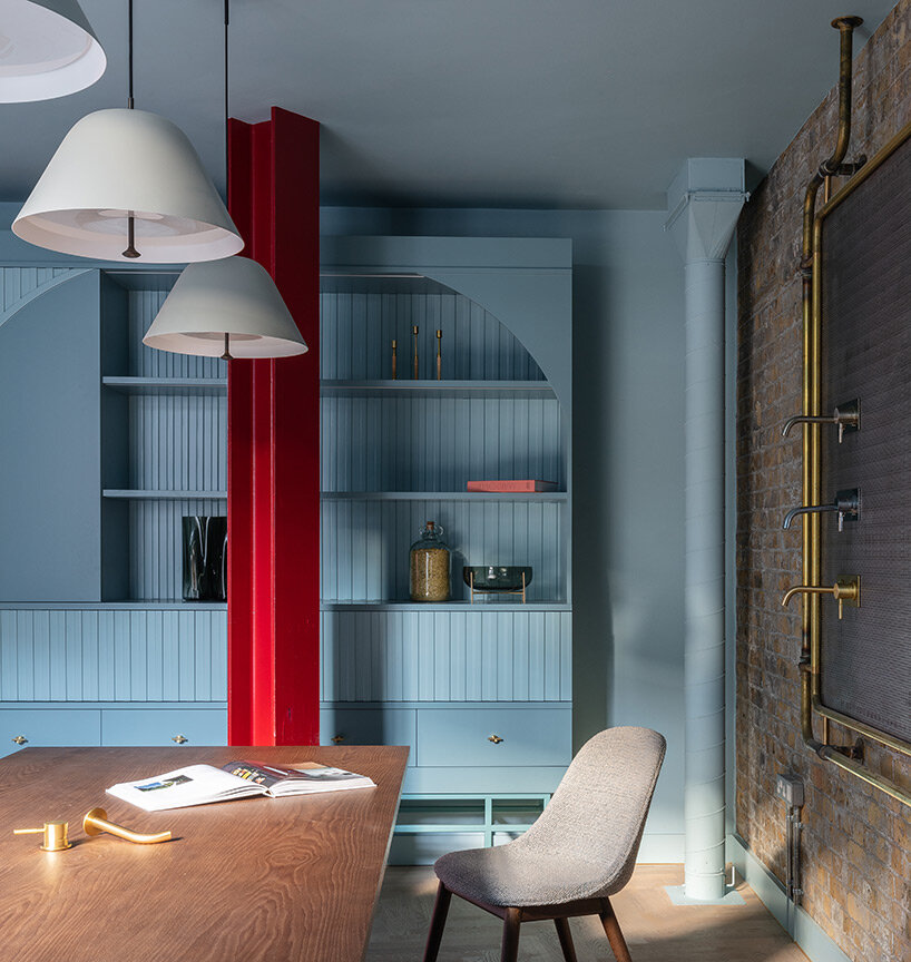 brightly colored fireplaces, boilers and resin panels complete the London showroom of Holloway li