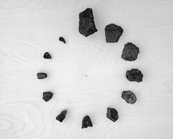 clock made of coal ticks down to climate change in new artwork by reza aliabadi