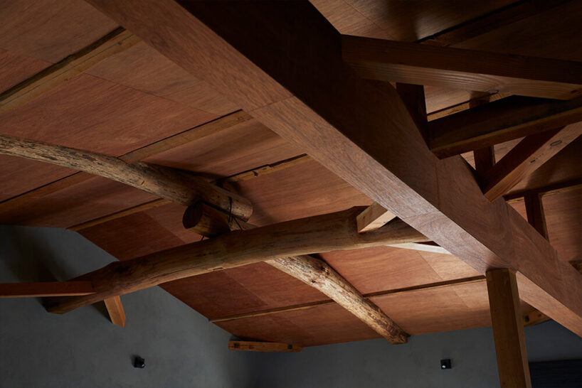 a double height void cuts through this house in japan