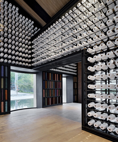 renovated cotton factory in china features nearly 5,000 spindles to honor its history