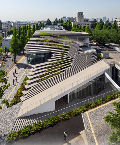 kengo kuma encloses this underground student center with a stepping green roof
