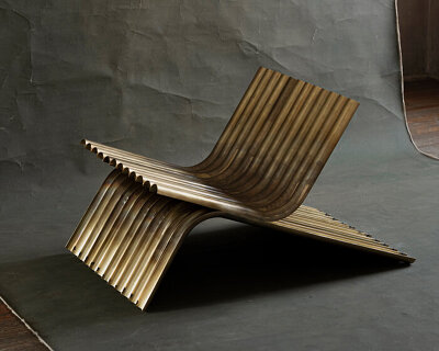 manu bañó expands his OBJ series with a lounge chair made of sliced brass tubes