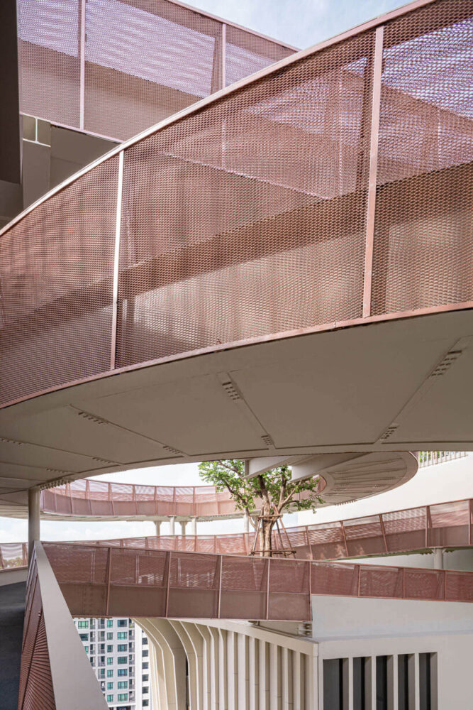 openbox architects inserts rose gold spiral ramp between two ...