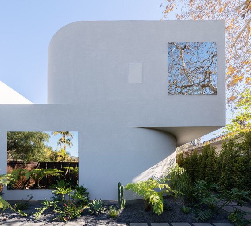 pentagon combines crisp angles with curves to shape 'radius house' in los angeles