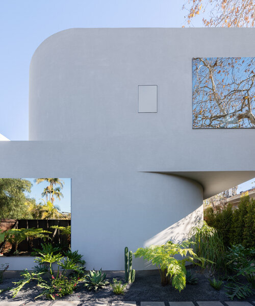 pentagon combines crisp angles with curves to shape 'radius house' in los angeles