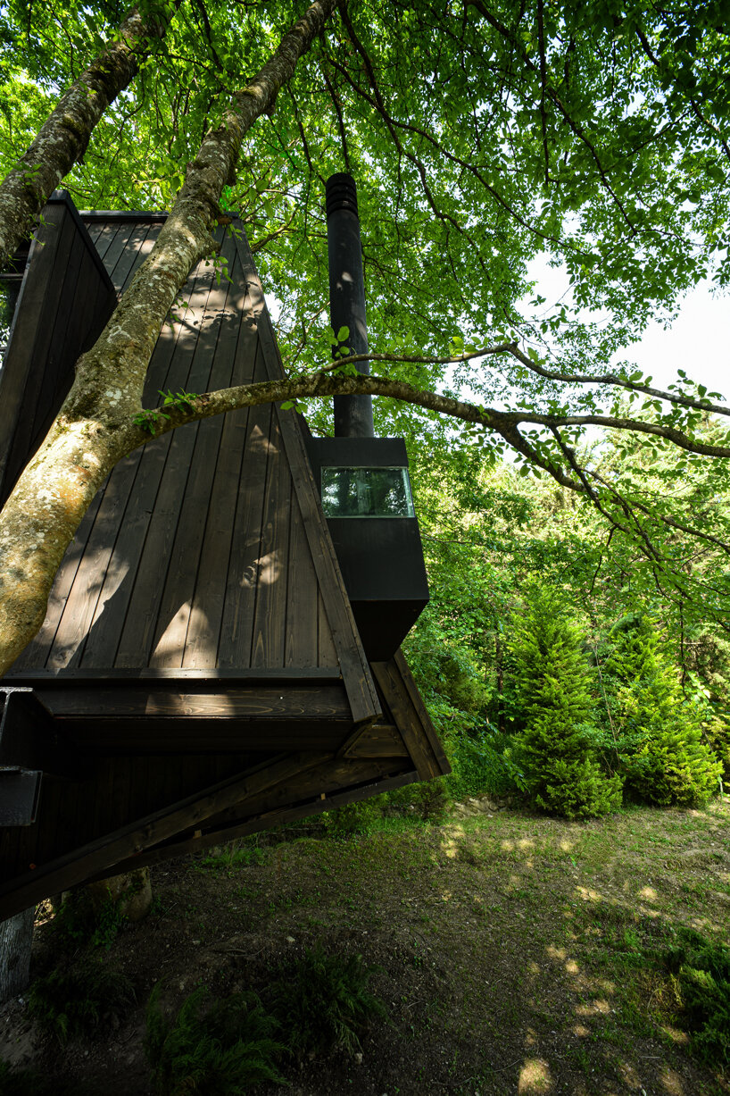 shaygan gostar designs treehouse in iran to evoke natural branch lines