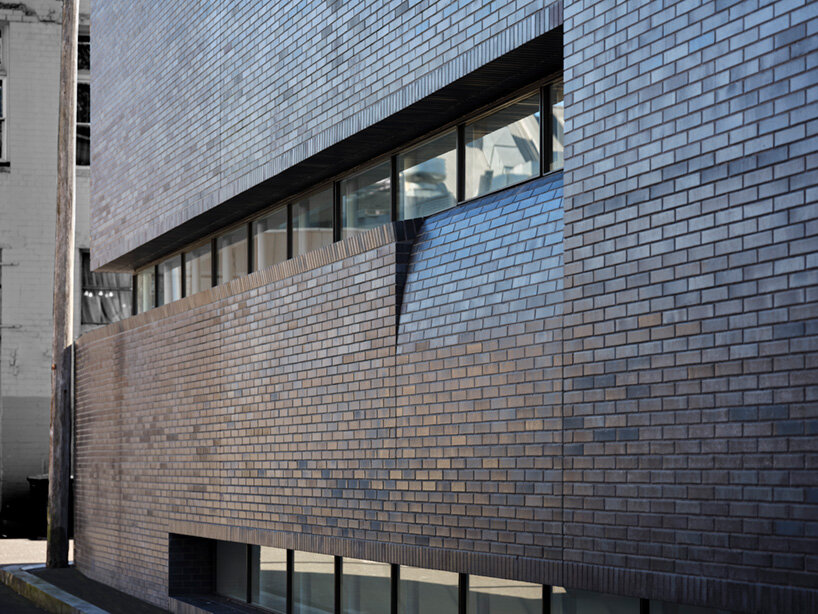 smart design studio's nickson street house takes shape with peeling brick surfaces