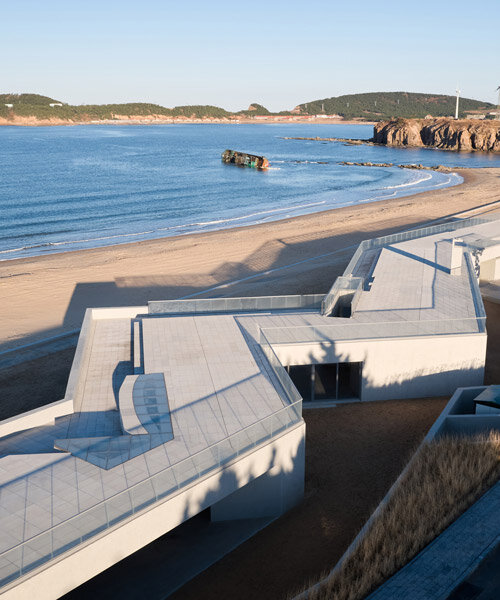 trace architecture office's zigzag building frames unfolding views of the seaside