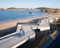 trace architecture office's zigzag building frames unfolding views of the seaside