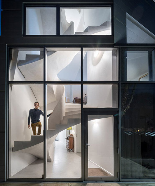 avignon architecte builds 'twist' house with sculptural ribbon staircase in nantes, france