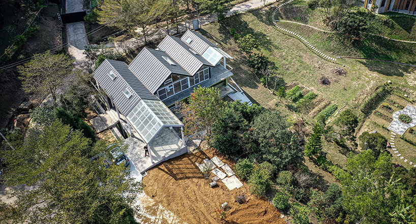 four continuous gable roofs top extroverted residence by emerge architects in taiwan