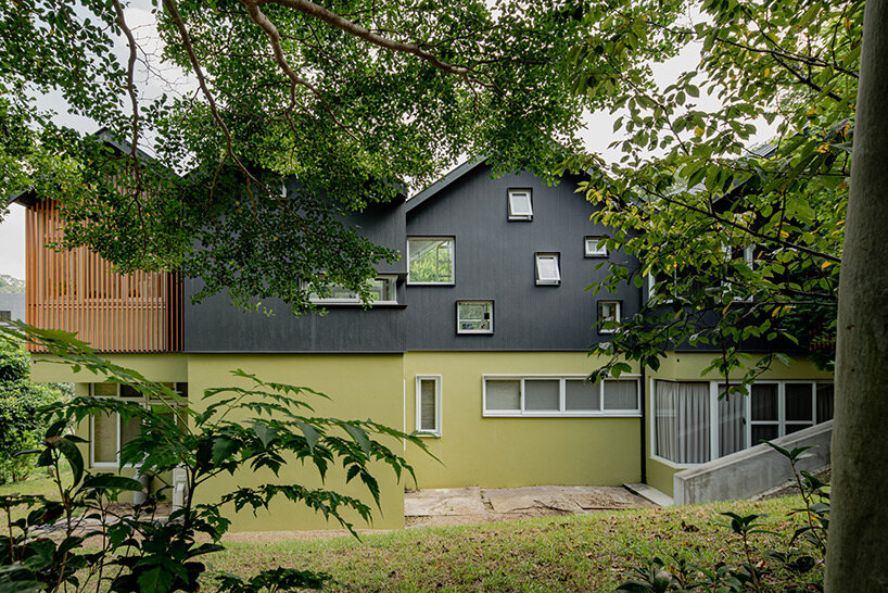 four continuous gable roofs top extroverted residence by emerge architects in taiwan