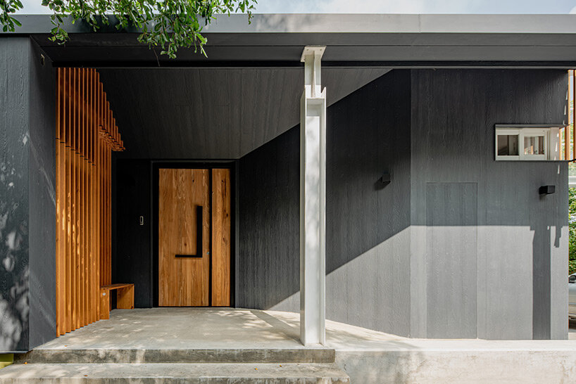 four continuous gable roofs top extroverted residence by emerge architects in taiwan