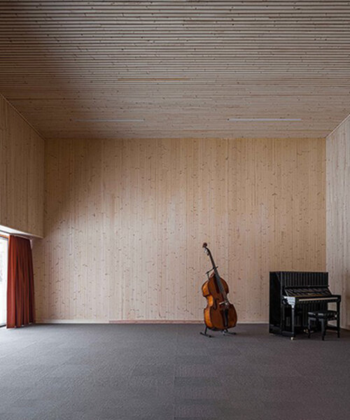 wooden and neat interior characterize this culture school in norway