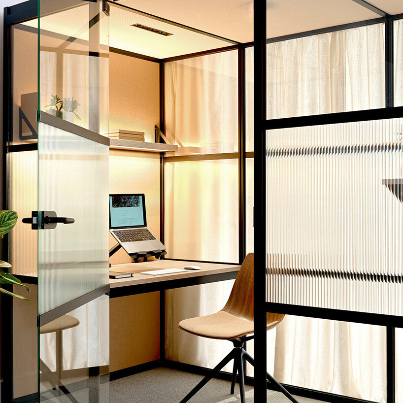 boss design adapts to the flexible workspace with cocoon-like chair & pods