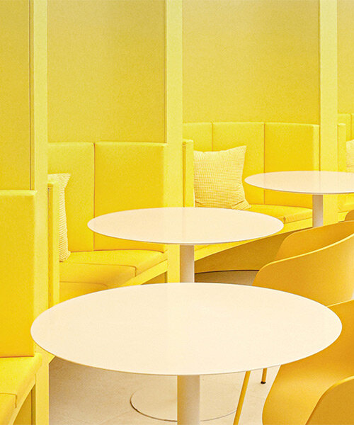 curved yellow walls define theatrical pastry shop interior by ramoprimo in beijing