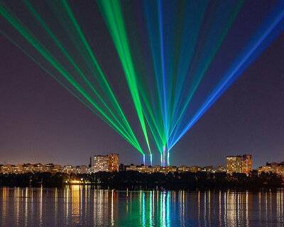 expolight turns old factory chimneys into digital 'light flowers' in ukraine