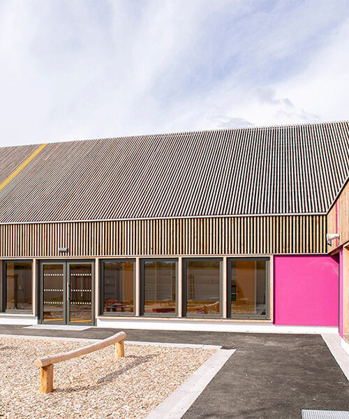 gable roofs, wooden cladding and pops of color shape FAUN's school group in rural france