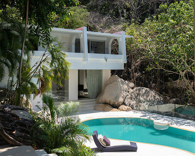geometric house by sama arquitectos blends harmoniously into verdant site in mexico