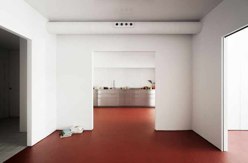 mirrored surfaces expand HANGHAR's 1970s apartment renovation in madrid