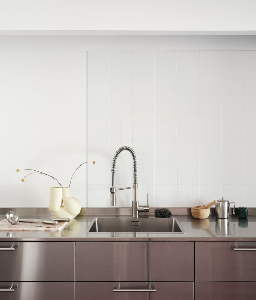 mirrored surfaces expand HANGHAR's 1970s apartment renovation in madrid