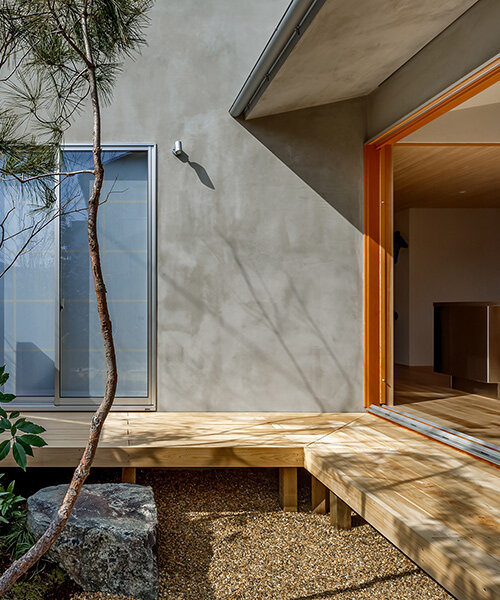 L-shaped house by hearth architects embraces vivid courtyard in japan