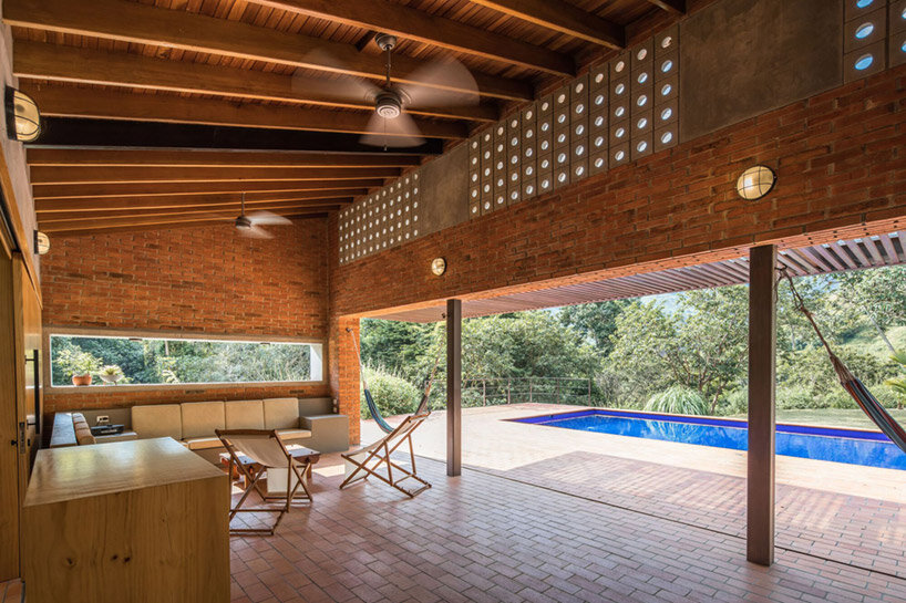 plan:b arquitectos nestles a warm brick country house in la siria, colombia