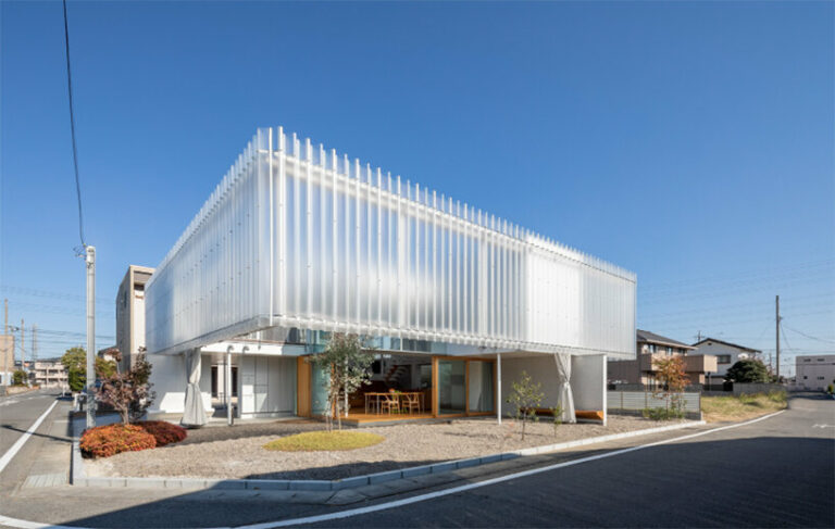 KACH wraps this house in yanakacho with a floating, translucent facade