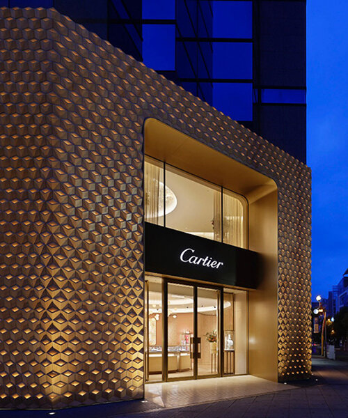 klein dytham architecture clads osaka's cartier store façade in luminous protruding diamonds