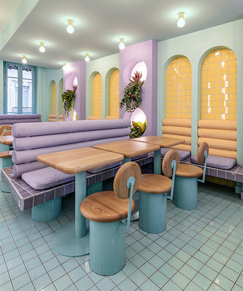 masquespacio infuses restaurant interior in france with pastel tones and lush greenery