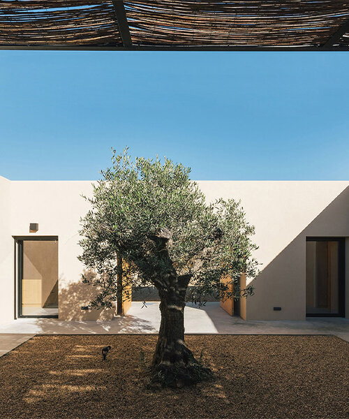 set in rural portugal, this single-volume house is shaped around a central patio