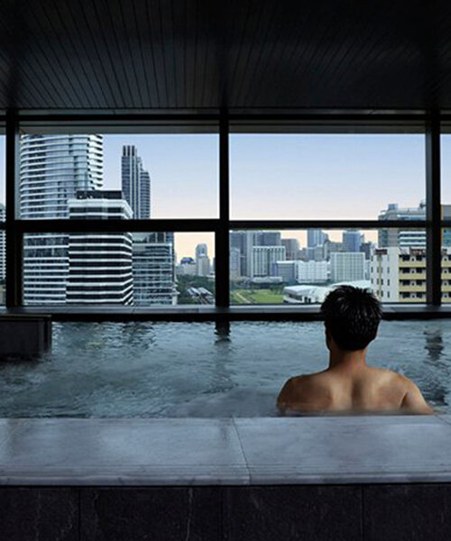 A-asterisk's skyscraper public baths frame views of bangkok city