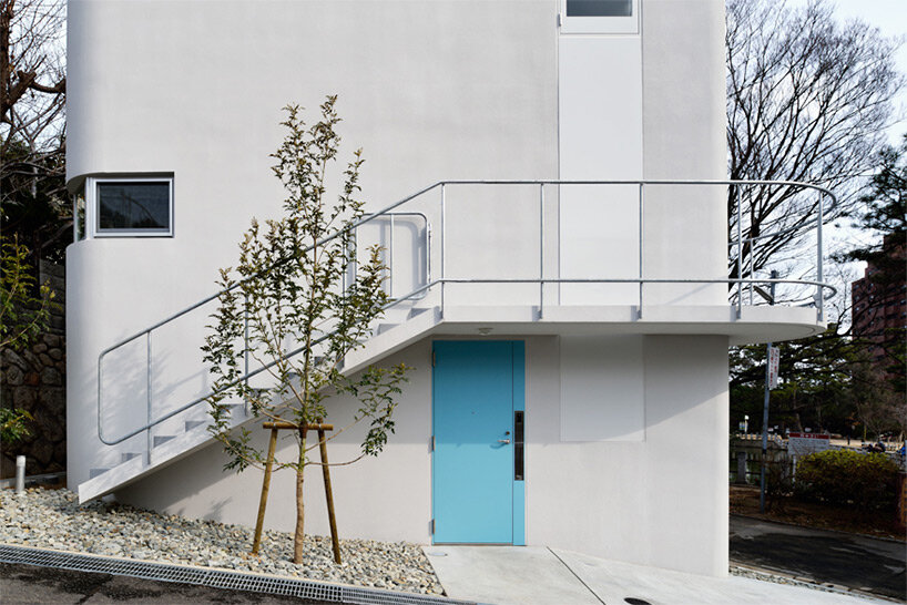 this private residence in kobe, japan, is shaped like a boat hull