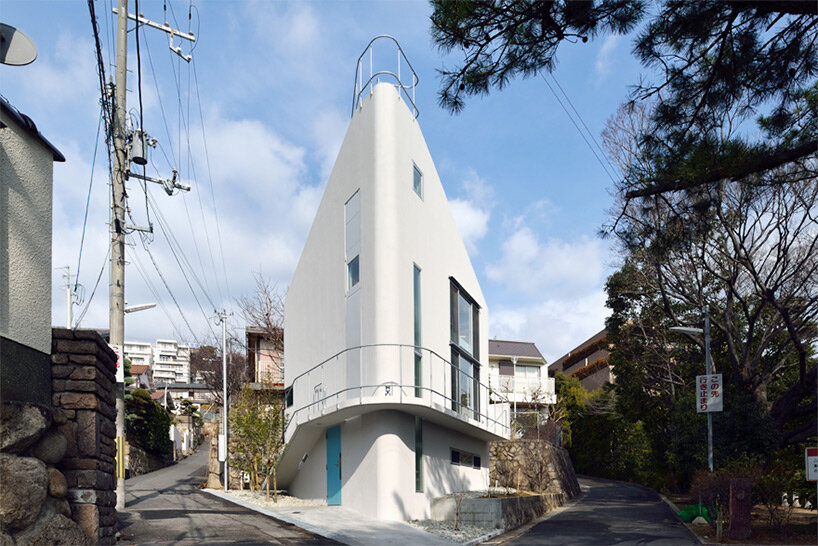 this private residence in kobe, japan, is shaped like a boat hull