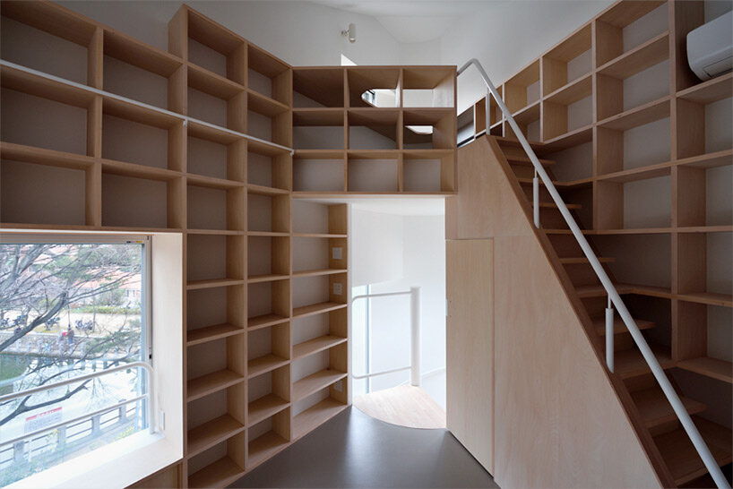 this private residence in kobe, japan, is shaped like a boat hull