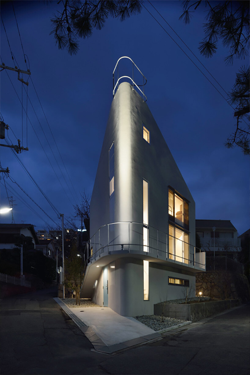 this private residence in kobe, japan, is shaped like a boat hull