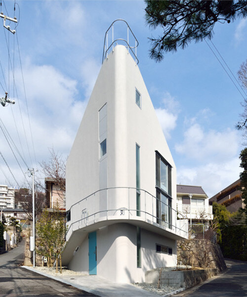 this private residence in kobe, japan, is shaped like a boat hull