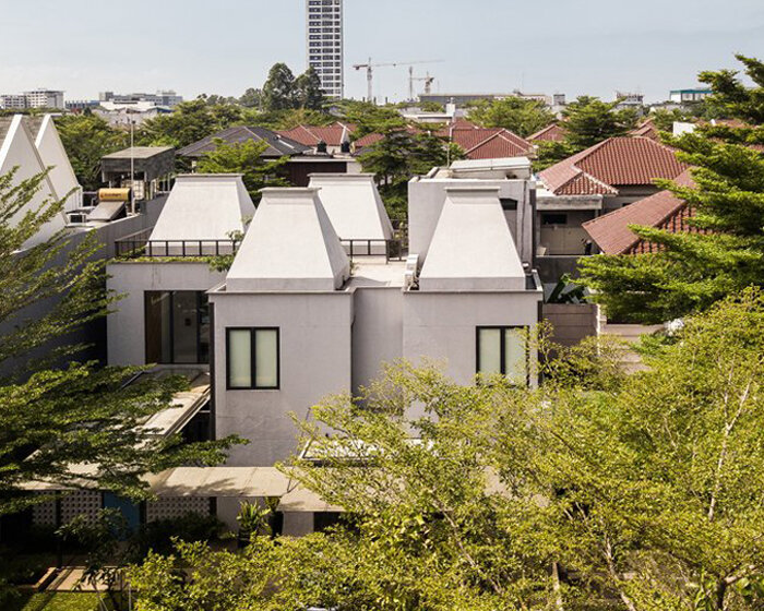 RAW architecture crowns indonesian house with six tapered skylights