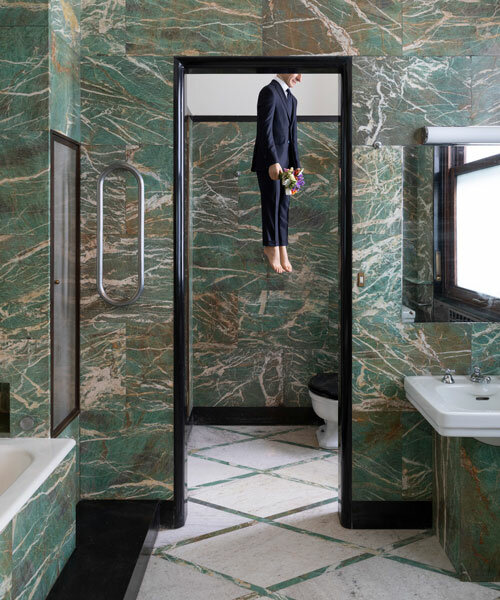 a self-portrait by maurizio cattelan hangs in the bathroom of milan's massimo de carlo gallery