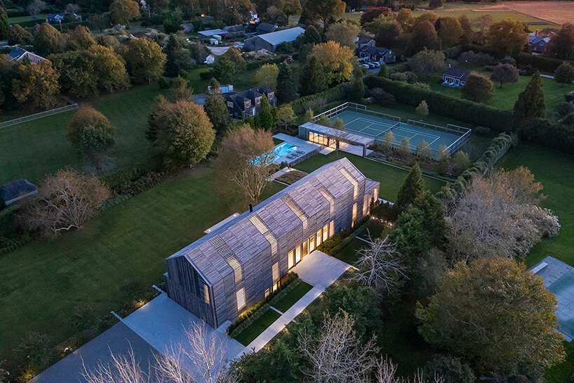 birdseye's lathhouse in the hamptons references traditional gabled farm structures