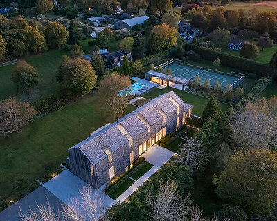 birdseye's lathhouse in the hamptons references traditional gabled farm structures