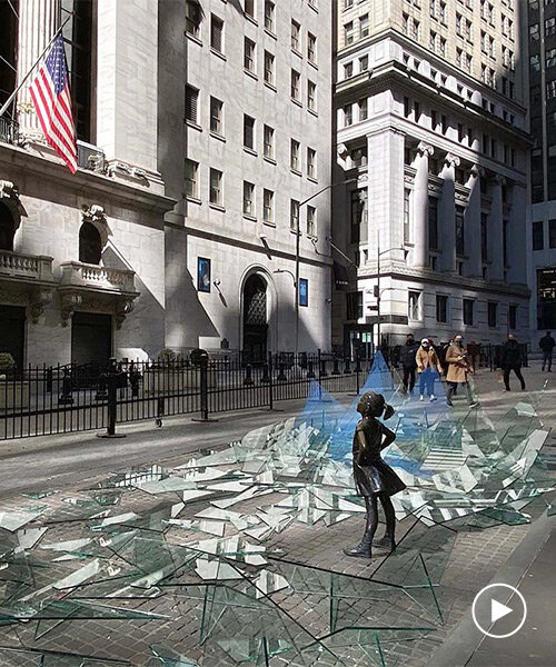 broken glass surrounds fearless girl statue in NYC to celebrate international women's day
