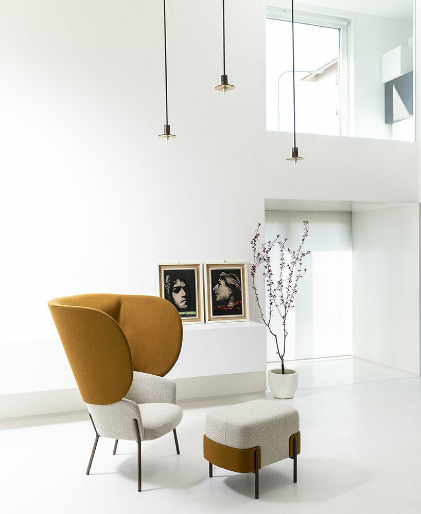 bross' expanded lounge system pairs woodwork with enveloping upholstery