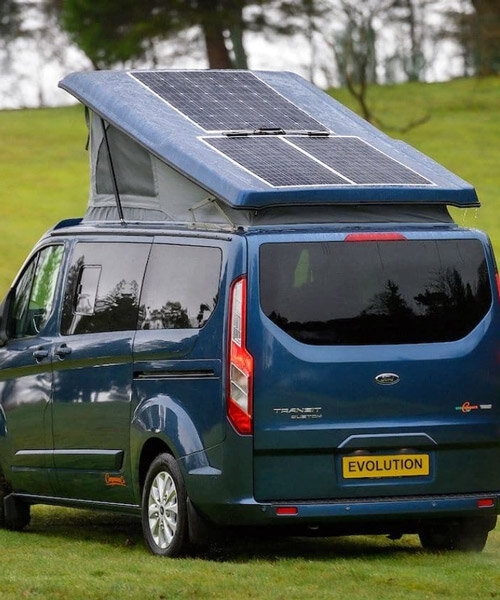 solar panels charge the new spacious ford camper, making it fully electric