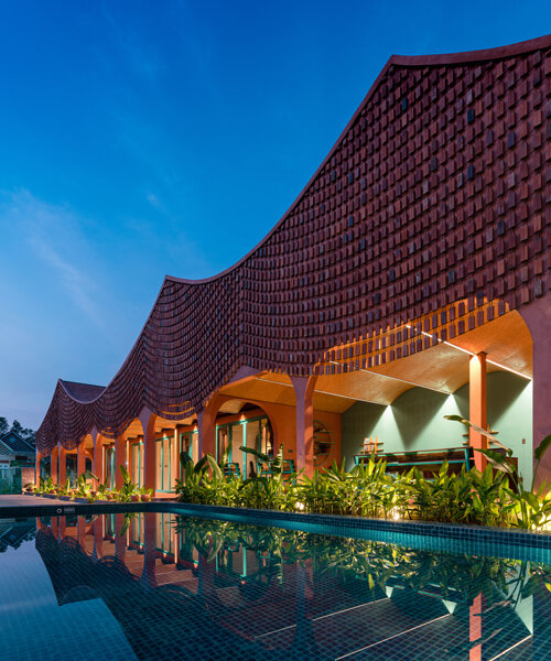 block architects drapes this duyen casa II hotel with a delicate brick 'curtain'