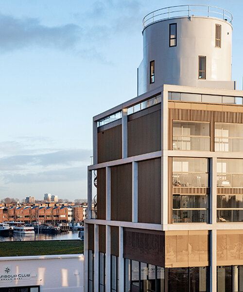 three converted wine silos top amsterdam’s new 'harbour club' by LEVS architecten