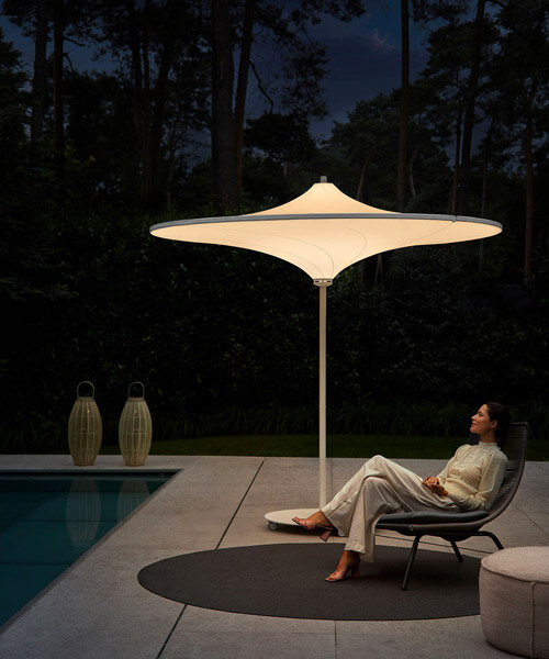 belgium-designed hulasol is a sun umbrella by day and an outdoor lamp by night