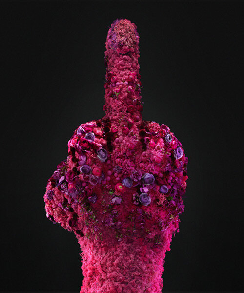 this massive middle finger sculpture made of flowers bids farewell to winter